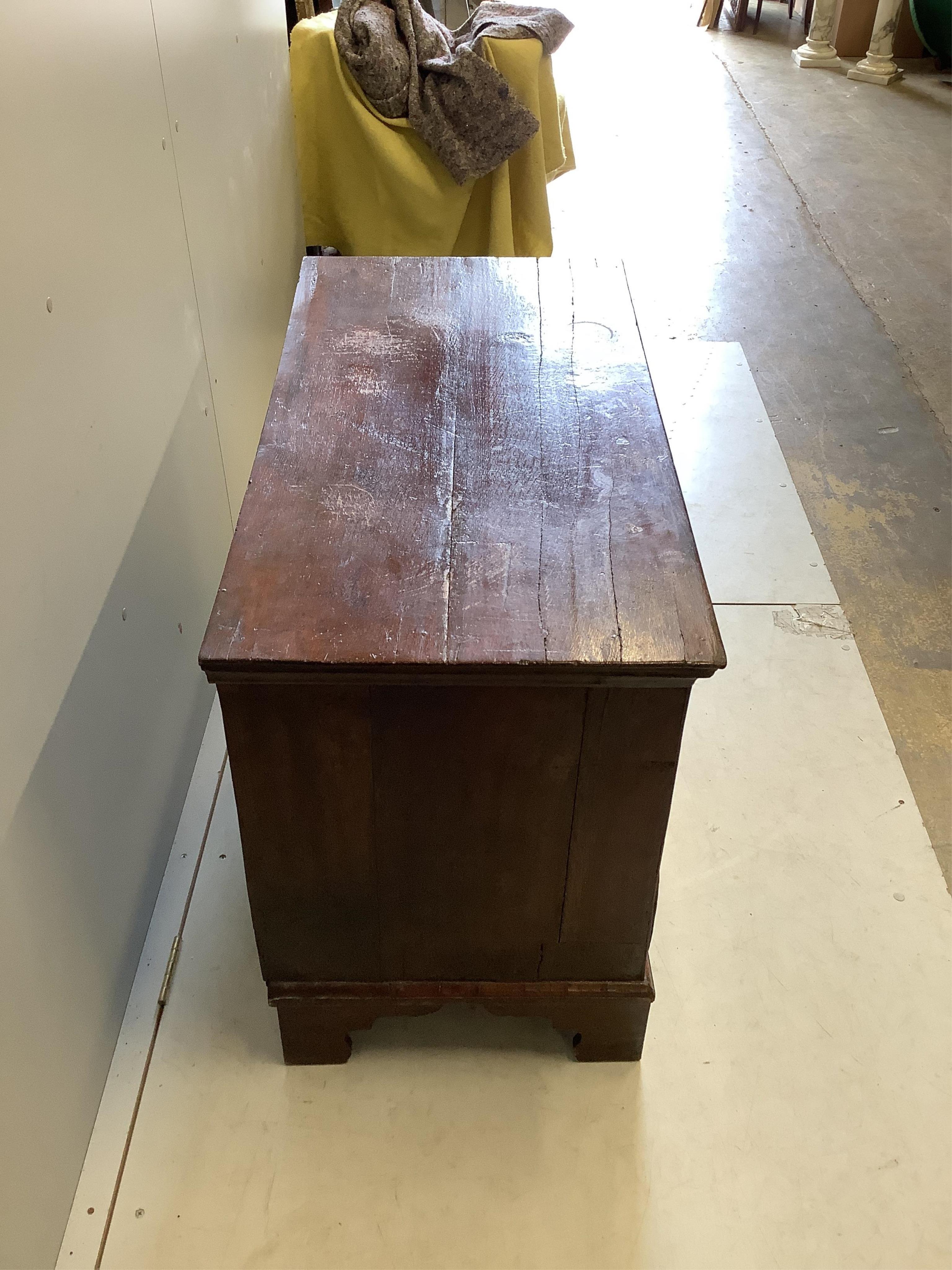 An 18th century walnut chest of four drawers, adapted, width 97cm, depth 50cm, height 73cm. Condition - poor